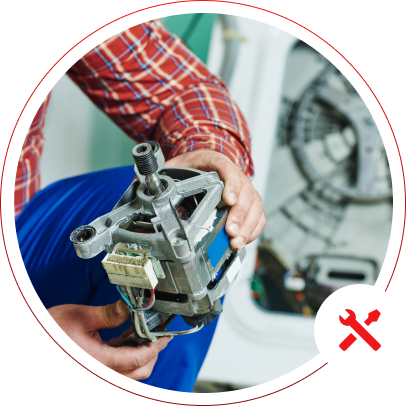 h2 03 Person holding a machine part indoors.