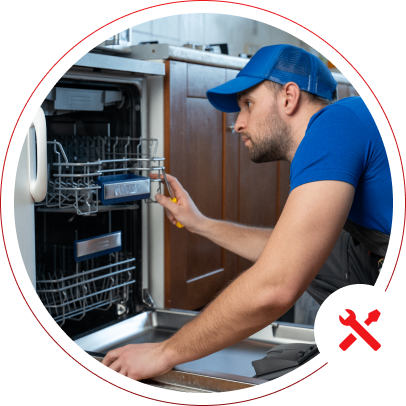 h2 07 Technician repairing a dishwasher in kitchen.